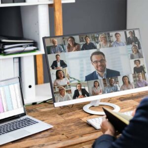 Professional on a zoom conference training in his home office