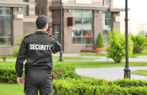 Security guard patrolling the area of a workplace